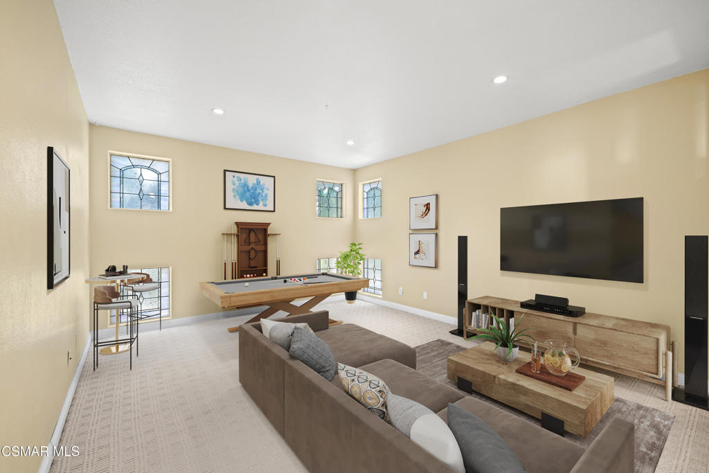 3881 Timberridge Road Moorpark, CA 93021 - Photo 19 of 28 a living room with furniture and a flat screen tv