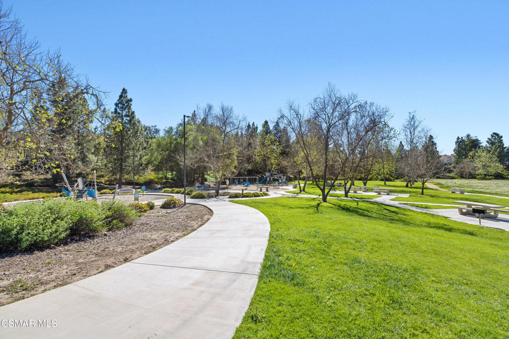 3881 Timberridge Road Moorpark, CA 93021 - Photo 28 of 28 a swimming pool with lots of tress in the background