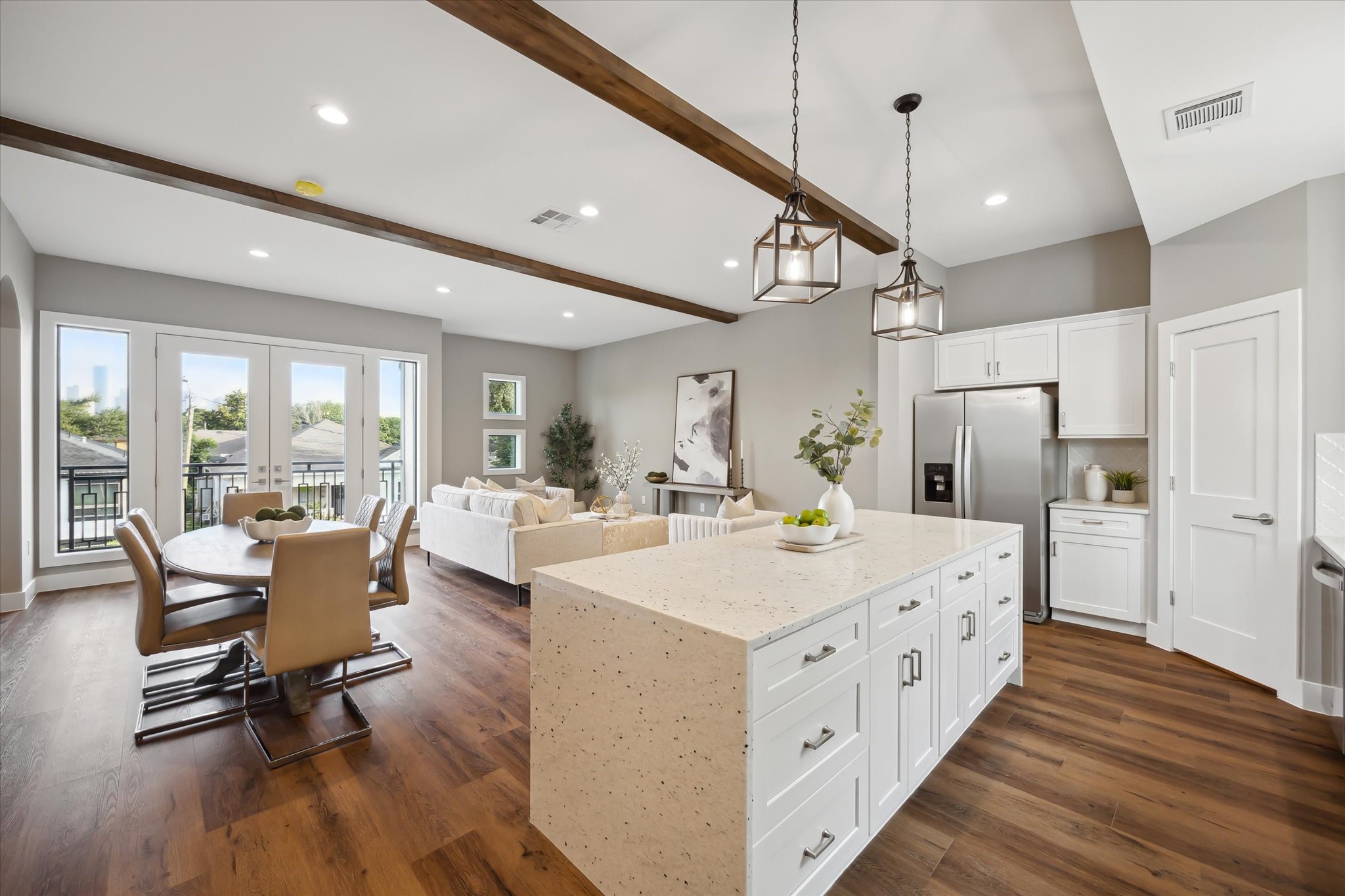 3102 Eunice Street Houston, TX 77009 - Photo 11 of 29 a large white kitchen with a large window and stainless steel appliances
