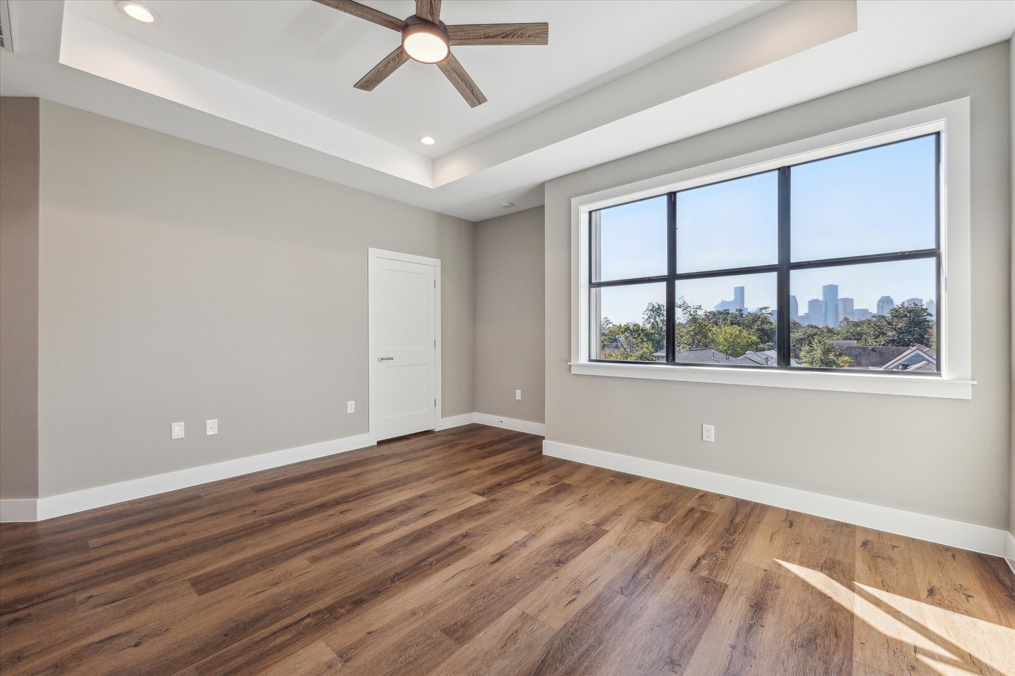 3102 Eunice Street Houston, TX 77009 - Photo 17 of 29 wooden floor in an empty room with a window