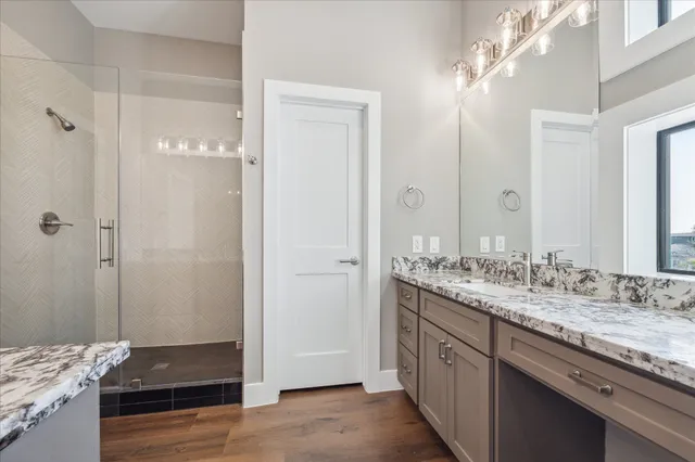 a kitchen with a sink and cabinets