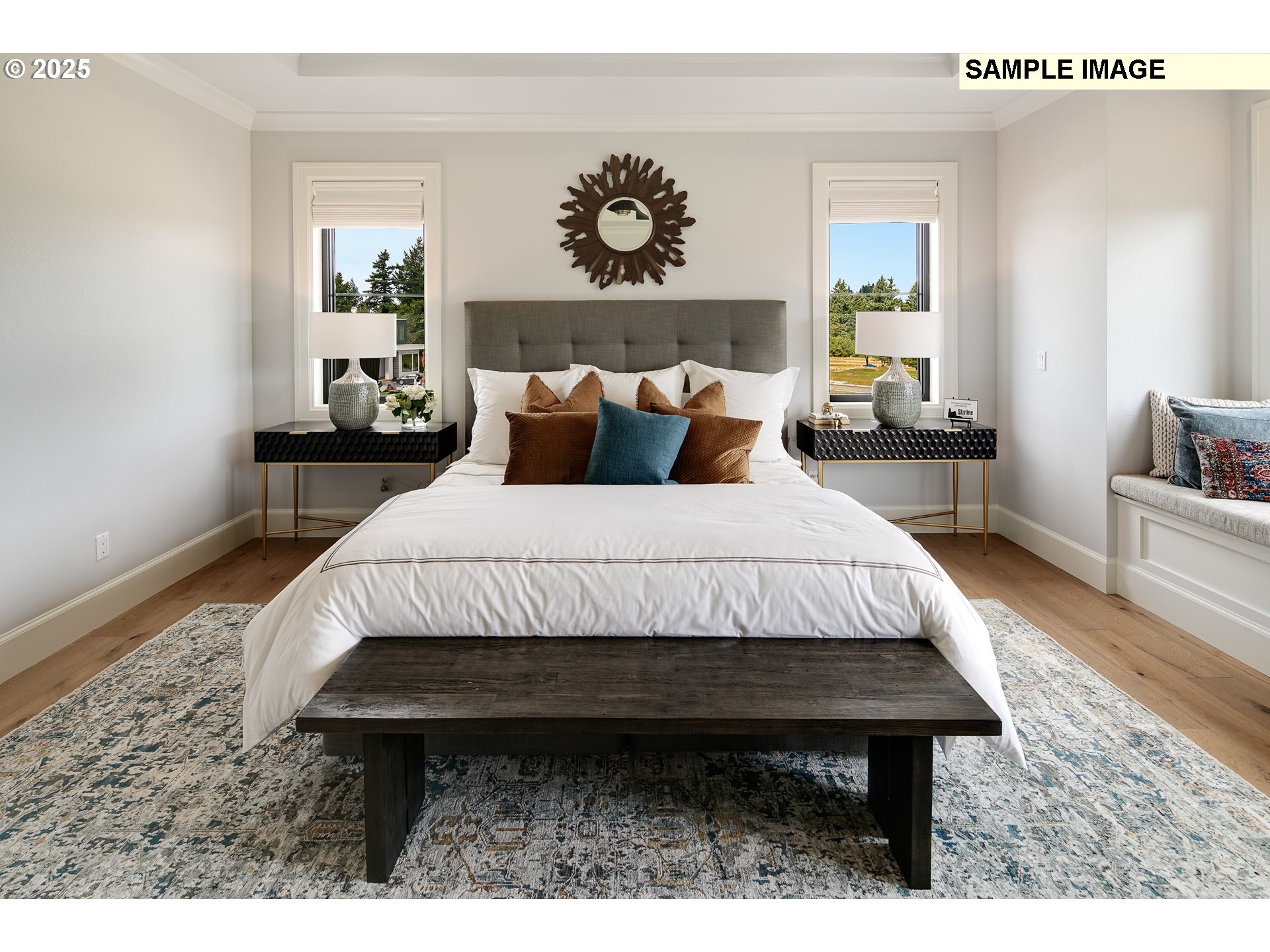 645 Northwest Halifax Street, Unit LOT 7 Camas, WA 98607 - Photo 13 of 13 a bed sitting in a bedroom next to a window with lamp