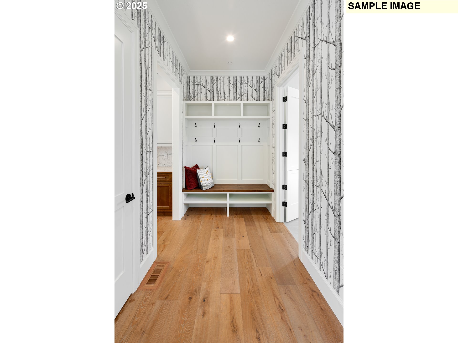645 Northwest Halifax Street, Unit LOT 7 Camas, WA 98607 - Photo 10 of 13 a view of a hallway with wooden floor and entryway