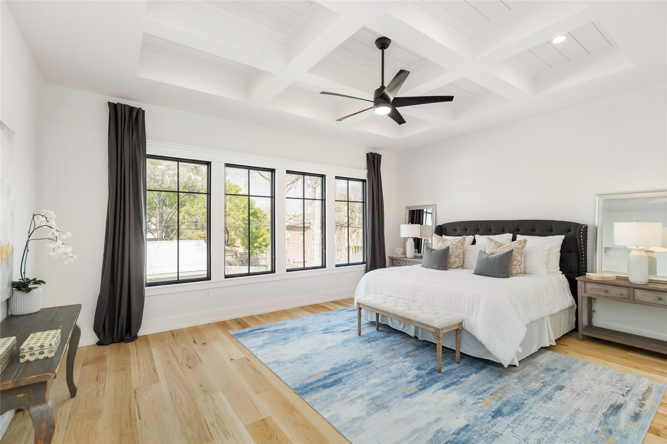 934 West 43rd Street Houston, TX 77018 - Photo 12 of 15 a bedroom with a large bed and a large window