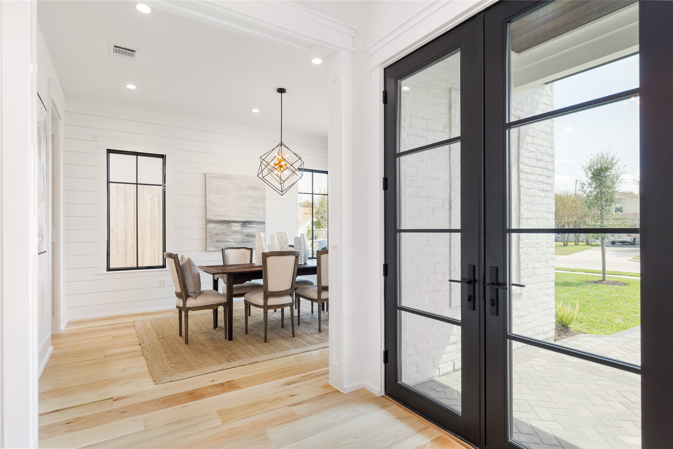 934 West 43rd Street Houston, TX 77018 - Photo 6 of 15 a view of a dining room with furniture window and wooden floor