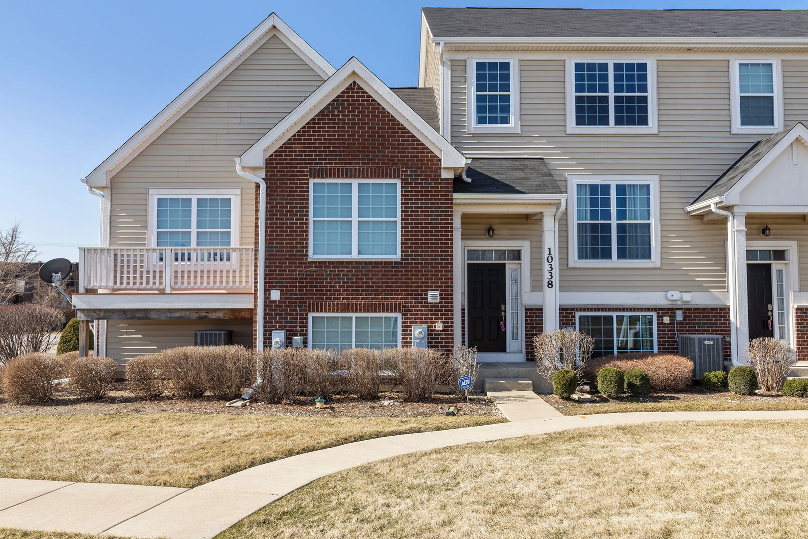 10338 Kerry Ridge Court Chicago Ridge, IL 60415 - Photo 1 of 16 a front view of a house with a yard