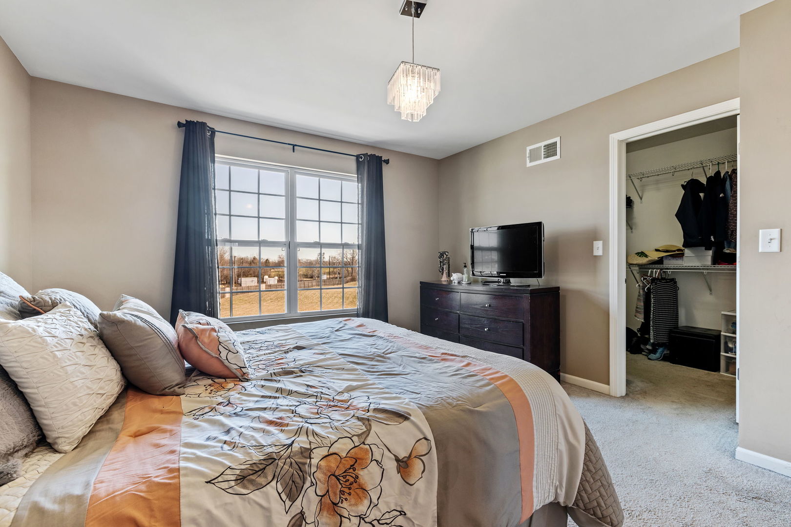 10338 Kerry Ridge Court Chicago Ridge, IL 60415 - Photo 11 of 16 a bedroom with a bed and a television