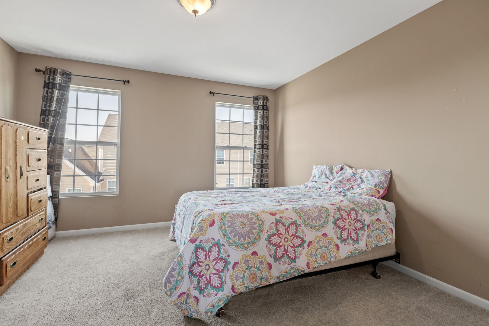 10338 Kerry Ridge Court Chicago Ridge, IL 60415 - Photo 13 of 16 a bedroom with a bed and a window