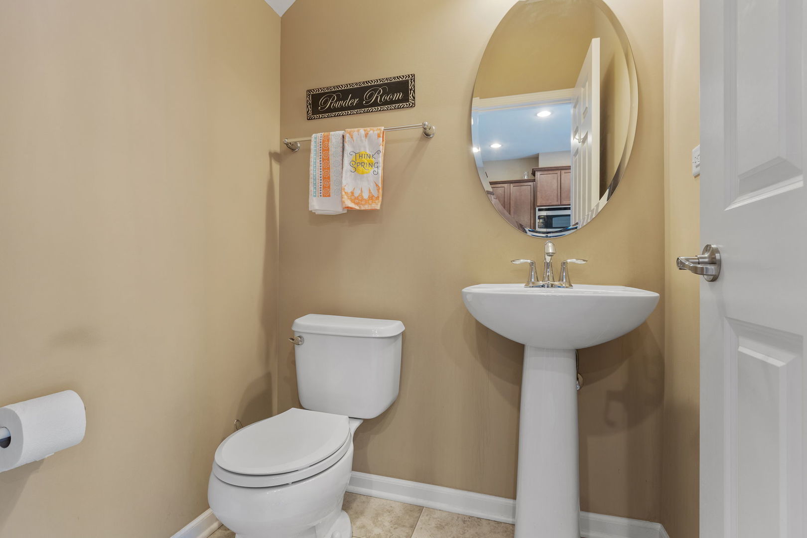 10338 Kerry Ridge Court Chicago Ridge, IL 60415 - Photo 9 of 16 a bathroom with a toilet sink and mirror