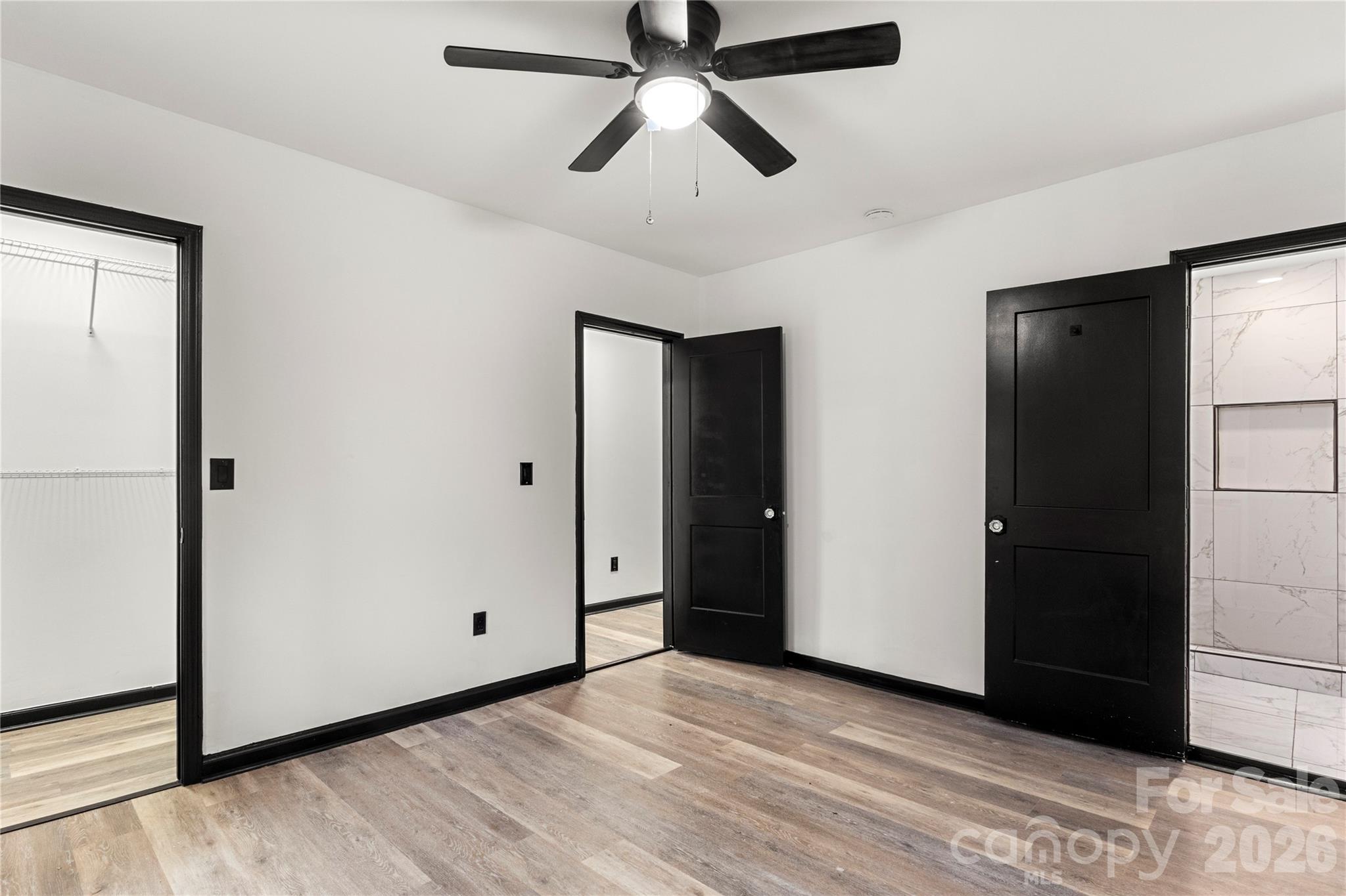 110 Courtland Street Chester, SC 29706 - Photo 15 of 22 a view of empty room with wooden floor and fan