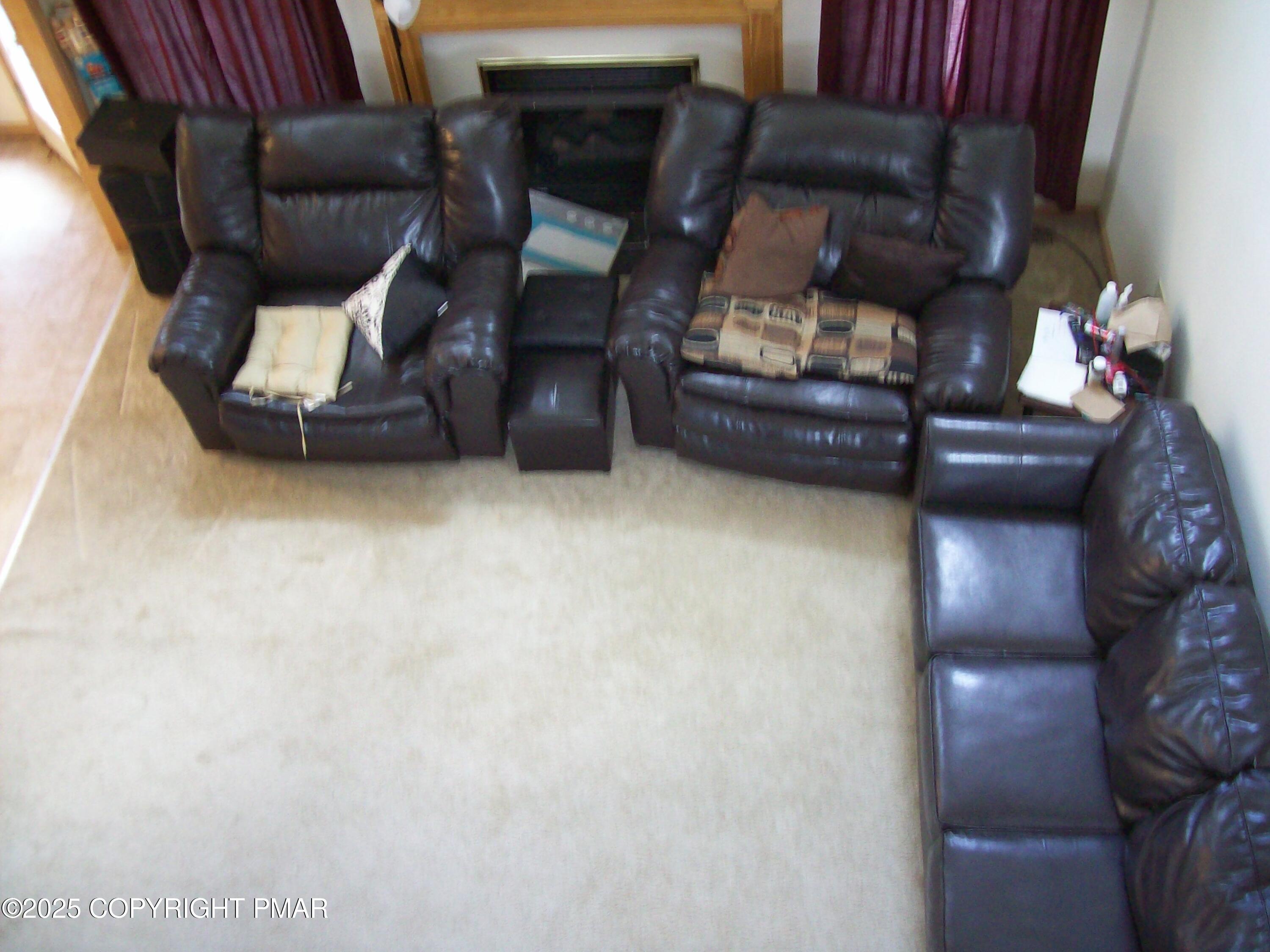 106 Bull Run Long Pond, PA 18334 - Photo 16 of 31 a living room with furniture and a fireplace