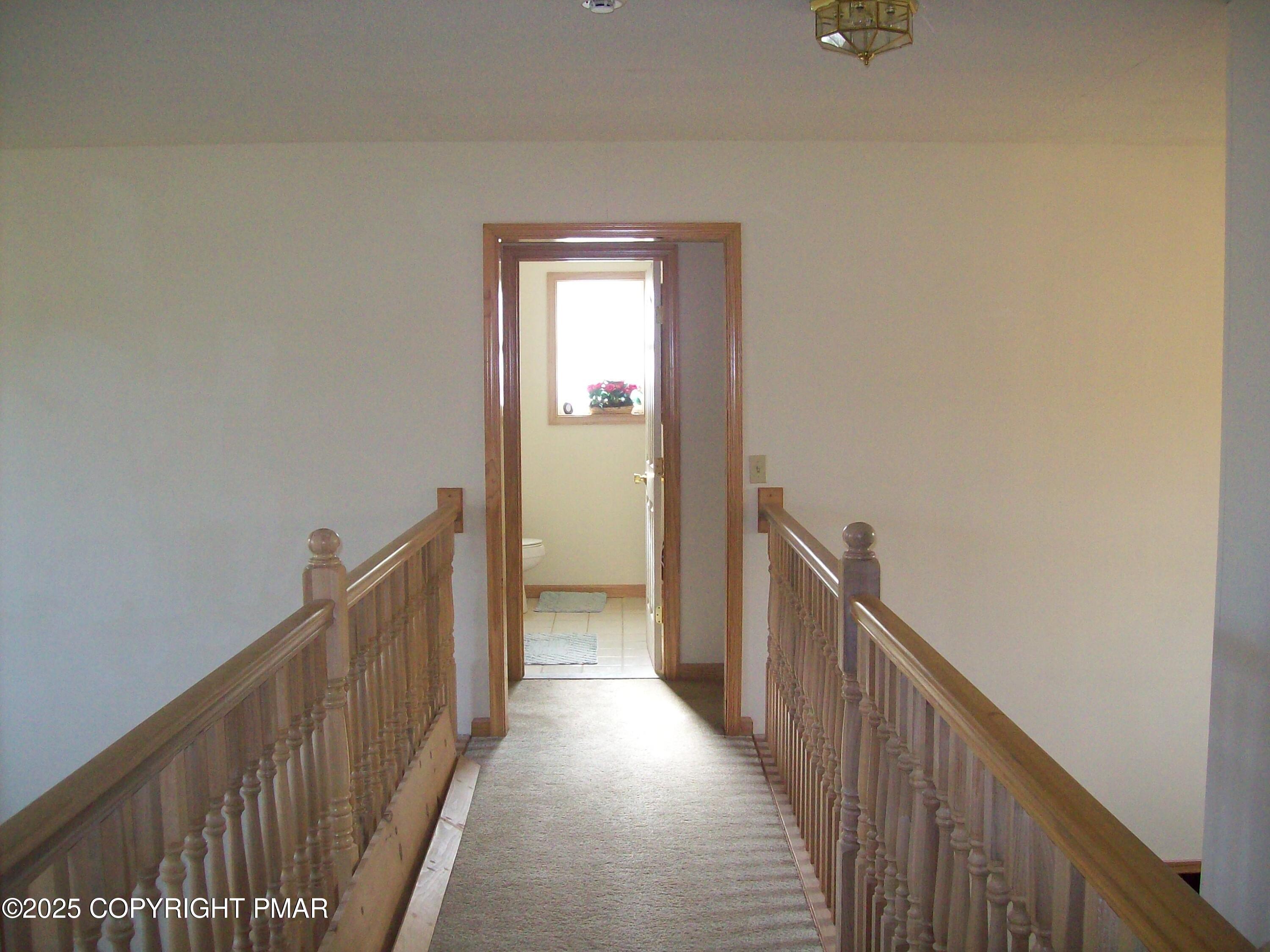 106 Bull Run Long Pond, PA 18334 - Photo 21 of 31 a view of a hallway with wooden floor