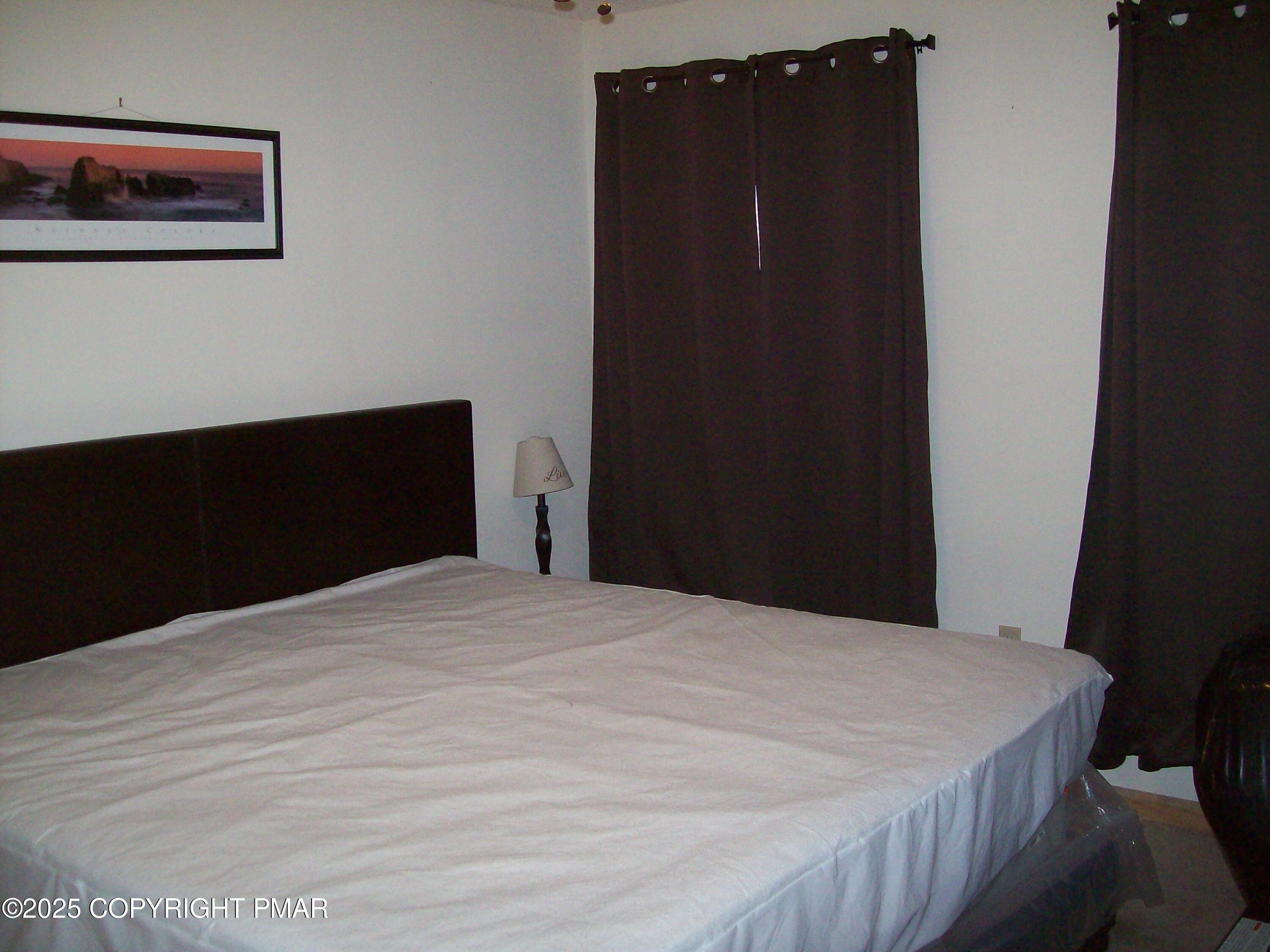 106 Bull Run Long Pond, PA 18334 - Photo 27 of 31 a bedroom with a bed and a dresser