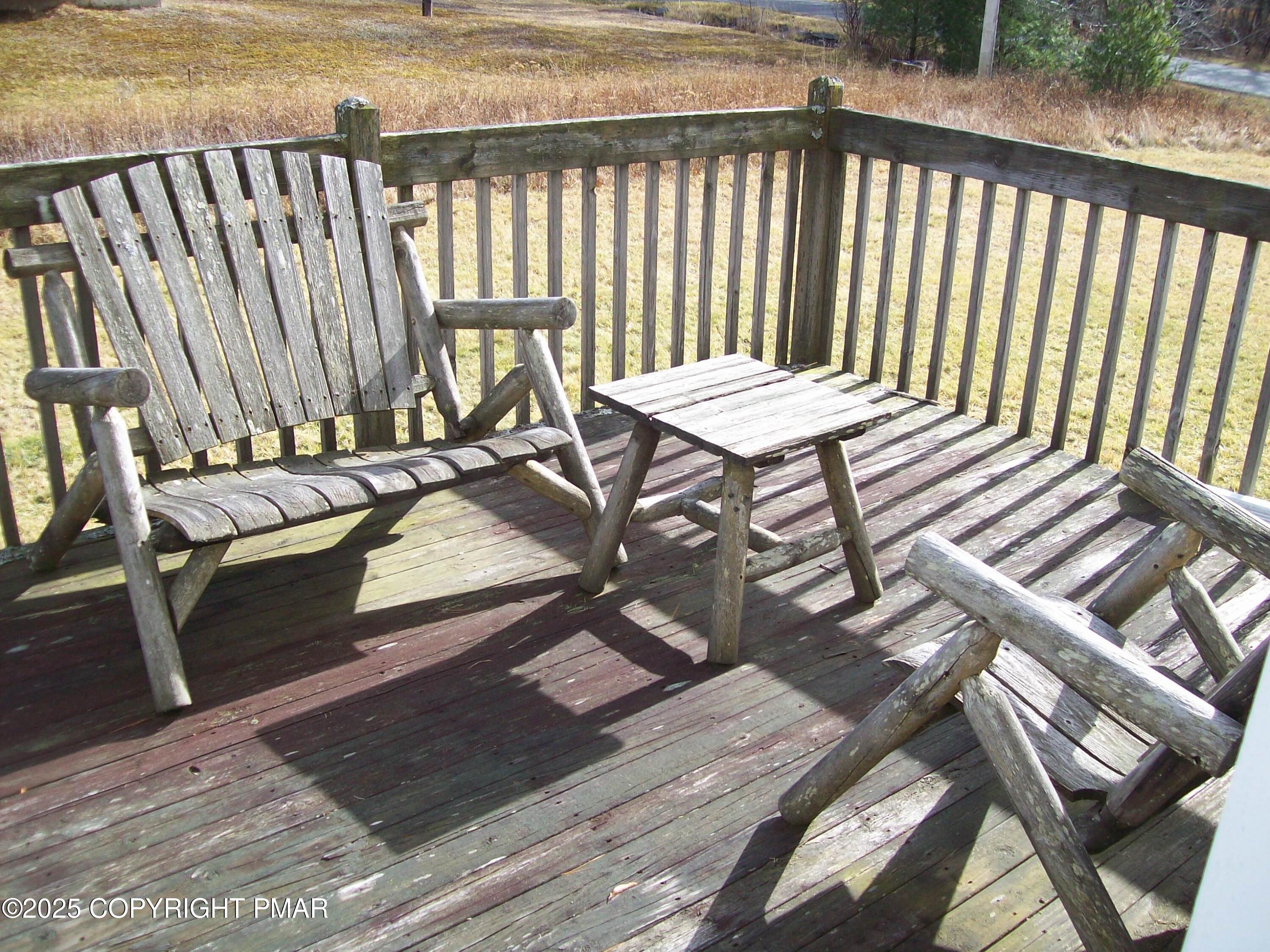 106 Bull Run Long Pond, PA 18334 - Photo 31 of 31 a view of a chairs and table on the wooden deck