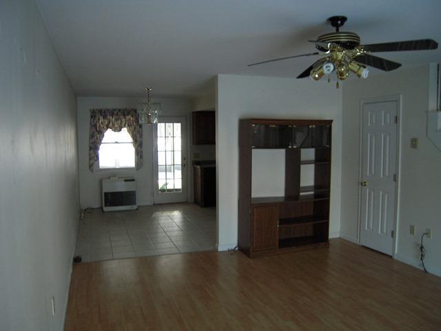 29 Old Orchard Road, Unit 3 Saco, ME 04072 - Photo 3 of 15 Living Room to the Kitchen