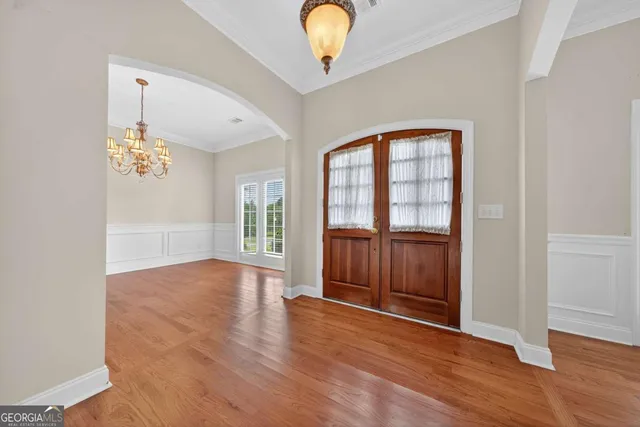 a view of a livingroom with wooden floor