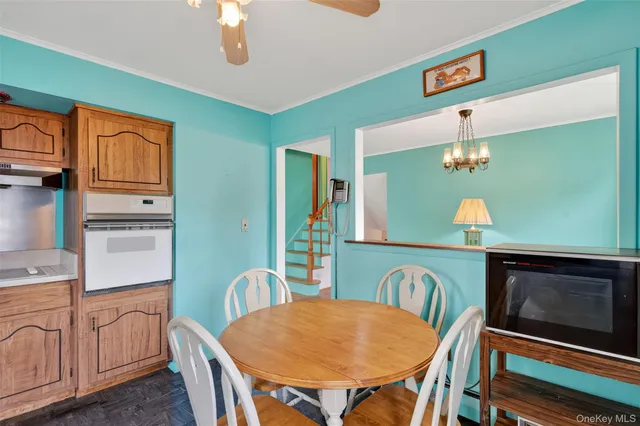 a view of a dining room with furniture