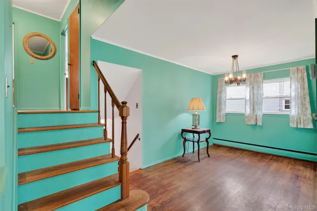 a room with window and stairs