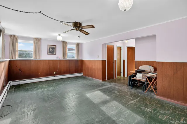 a view of room with furniture and a window