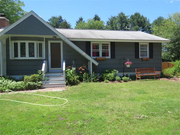 107 Lexington Road Billerica, MA 01821 - Photo 1 of 11 a front view of a house with a yard