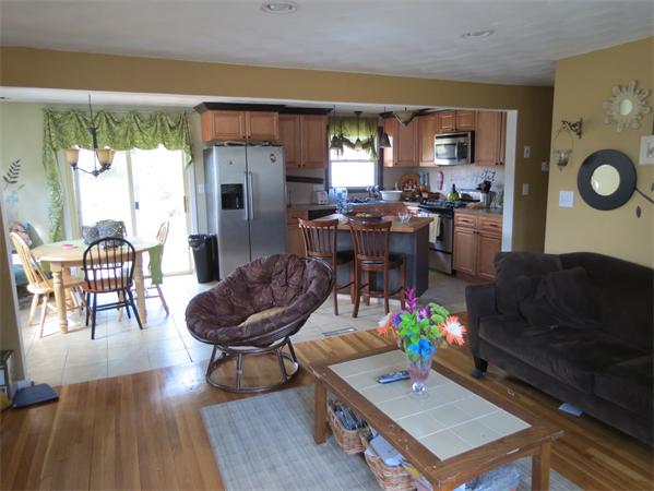 107 Lexington Road Billerica, MA 01821 - Photo 4 of 11 a living room with furniture and a large window