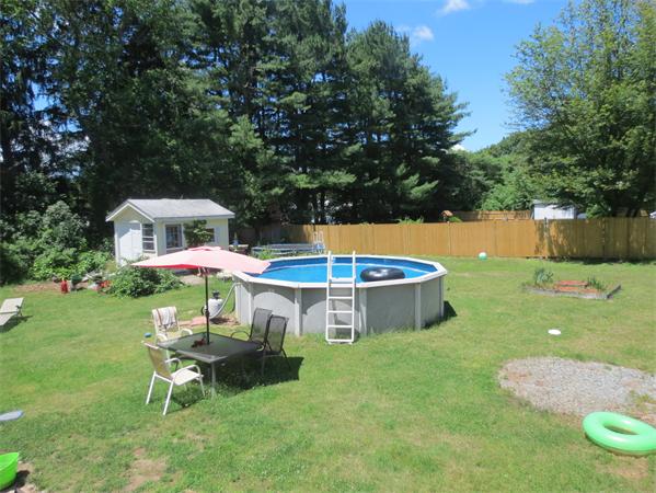 107 Lexington Road Billerica, MA 01821 - Photo 8 of 11 an outdoor space with furniture and garden