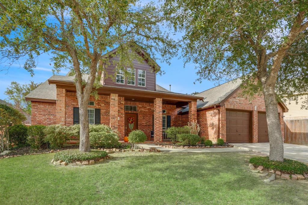 2006 Hayden Lane Corinth, TX 76210 - Photo 1 of 1 front view of a house with a yard