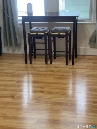 a kitchen with sink a cabinets and window