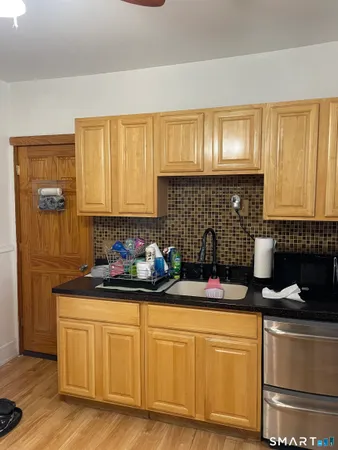 a room with a fireplace and a stove