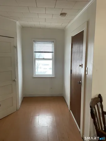 a kitchen with stainless steel appliances granite countertop a stove and a refrigerator