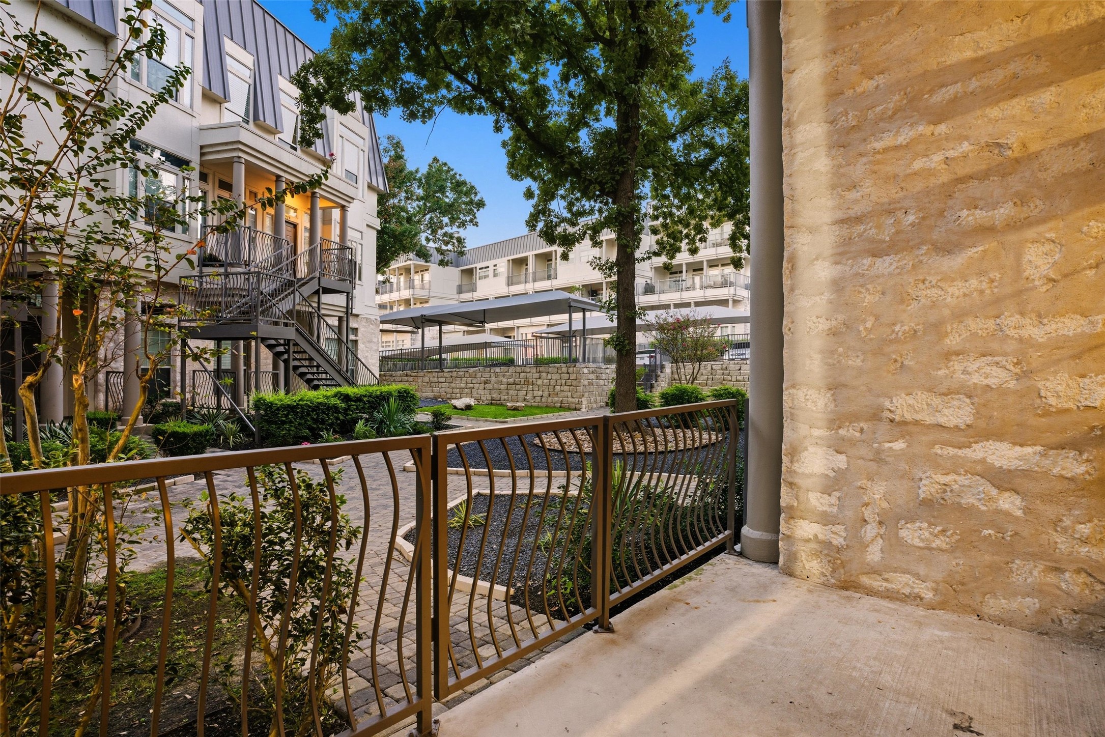 2918 Ranch To Market Road 620, Unit V267 Austin, TX 78734 - Photo 22 of 40 Large patio overlooks the courtyard.