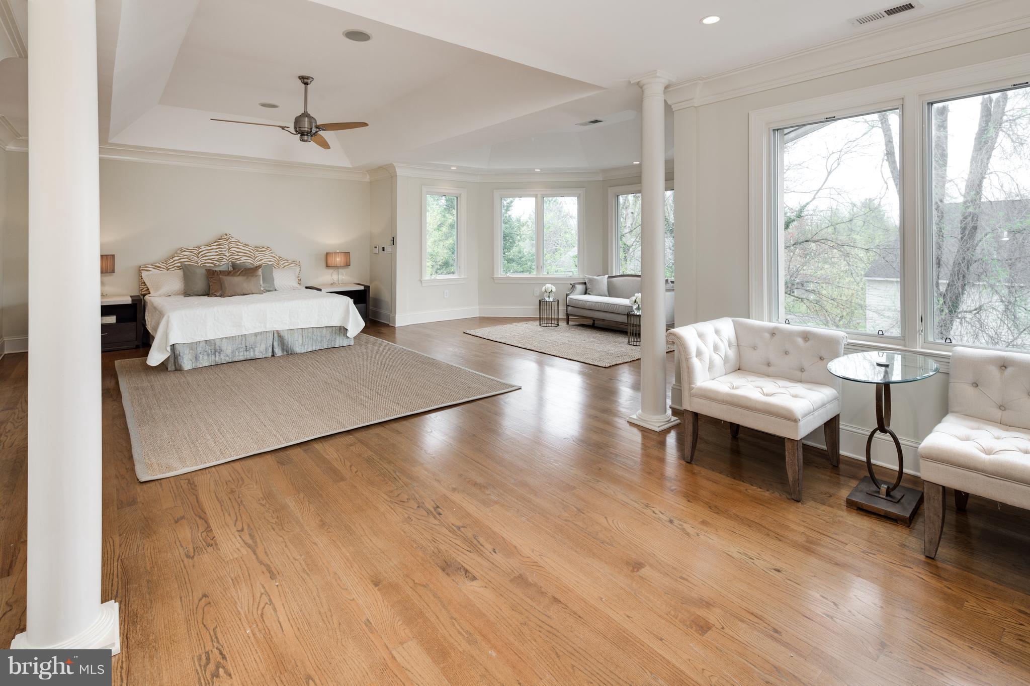 6802 Old Chesterbrook Road McLean, VA 22101 - Photo 18 of 30 a living room with furniture and a wooden floor