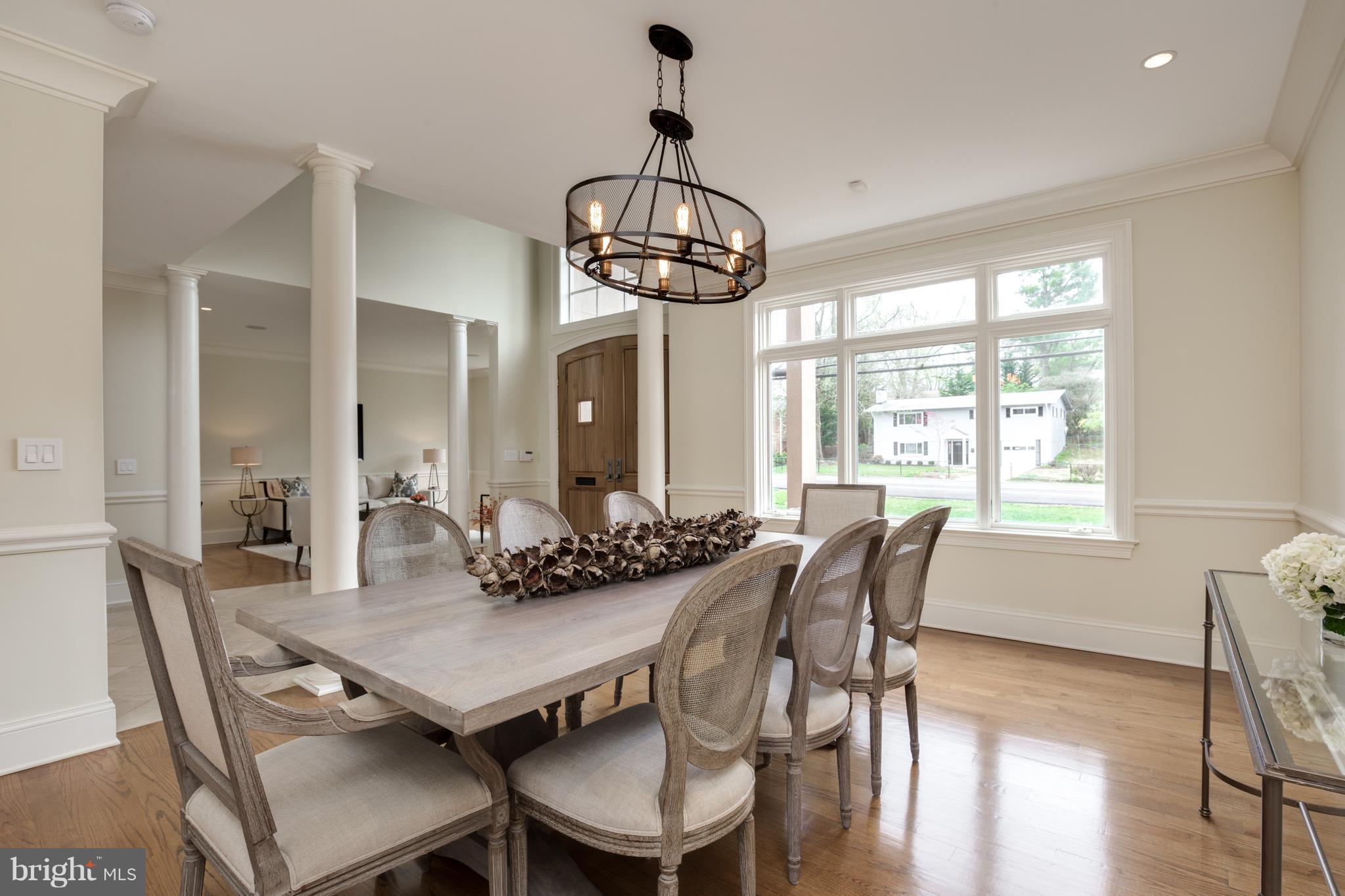 6802 Old Chesterbrook Road McLean, VA 22101 - Photo 7 of 30 a view of a dining room with furniture window and wooden floor