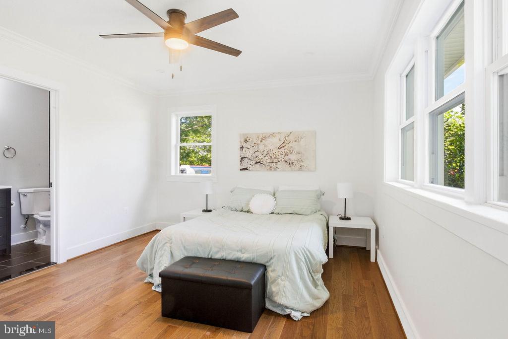 6620 Napoli Road Temple Hills, MD 20748 - Photo 17 of 38 a bedroom with a bed and a window