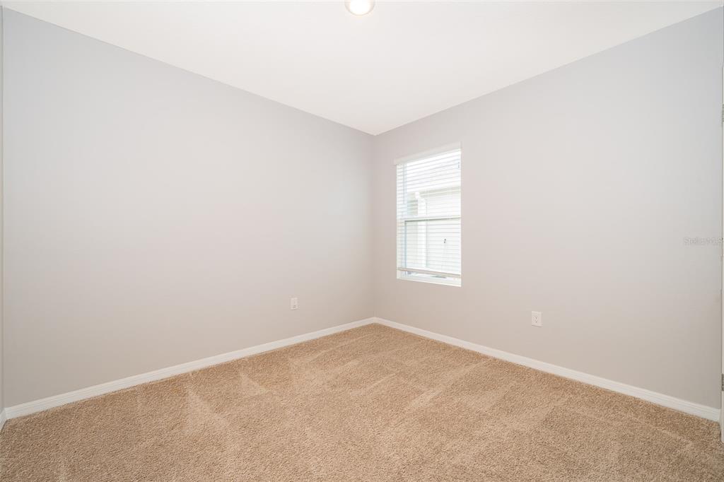 1500 Quinta Road Kissimmee, FL 34744 - Photo 12 of 34 an empty room with a window