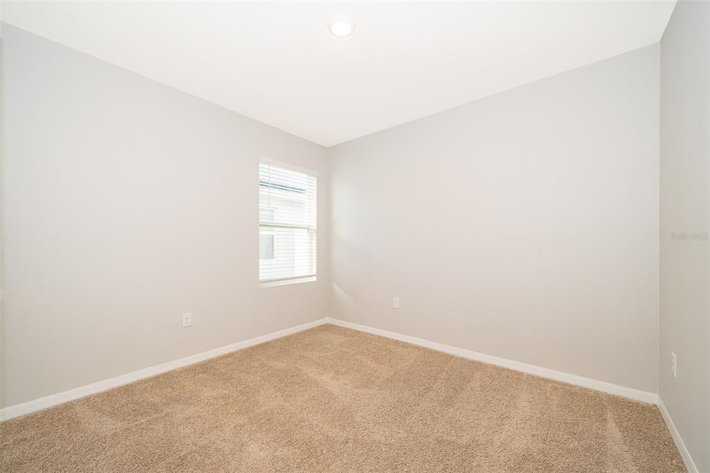 1500 Quinta Road Kissimmee, FL 34744 - Photo 13 of 34 an empty room with a window