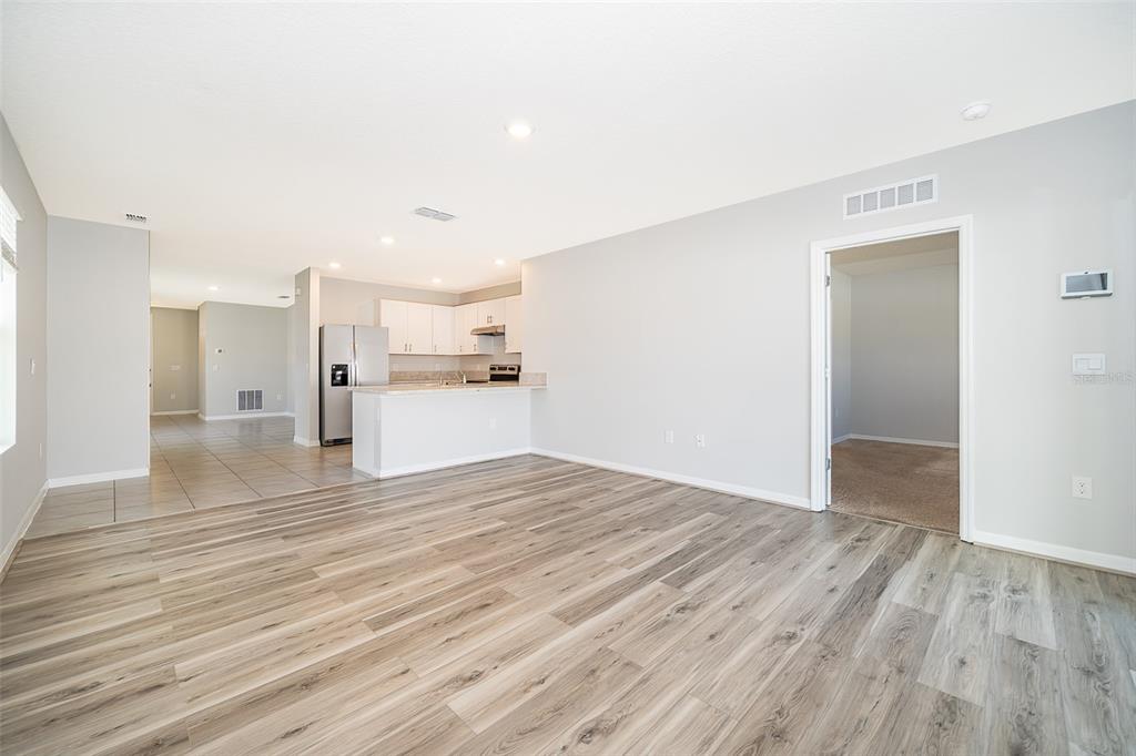 1500 Quinta Road Kissimmee, FL 34744 - Photo 15 of 34 a view of empty room with wooden floor