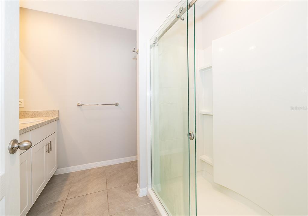 1500 Quinta Road Kissimmee, FL 34744 - Photo 18 of 34 a view of a bathroom from a hallway