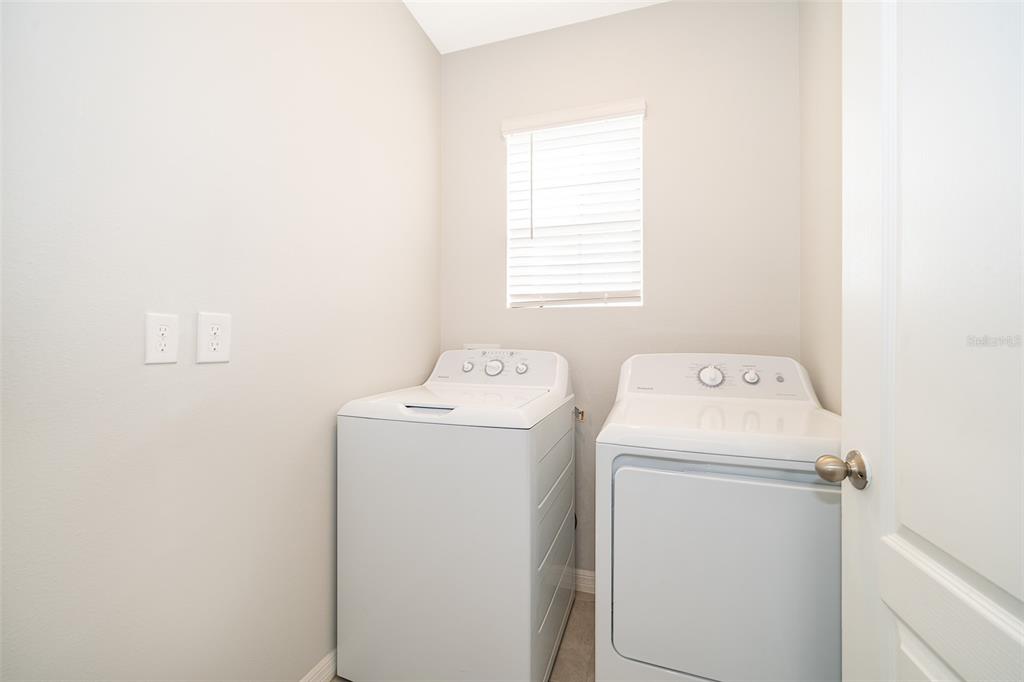 1500 Quinta Road Kissimmee, FL 34744 - Photo 20 of 34 a utility room with dryer and washer