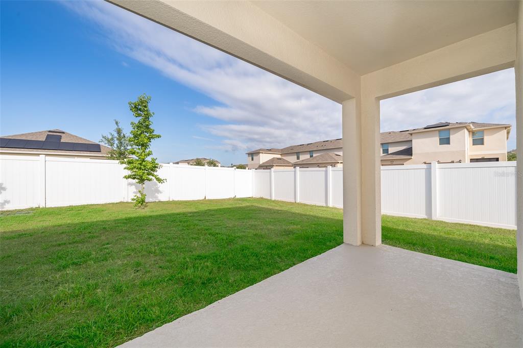 1500 Quinta Road Kissimmee, FL 34744 - Photo 21 of 34 a view of a house with a yard