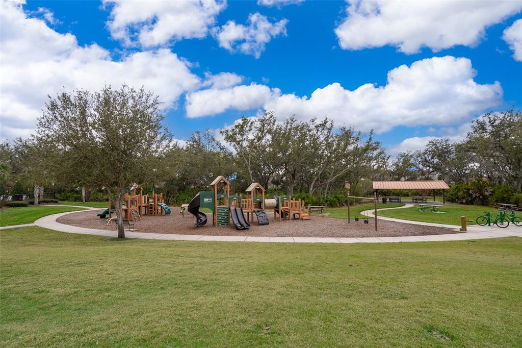 1500 Quinta Road Kissimmee, FL 34744 - Photo 26 of 34 a view of a park with swings and slides