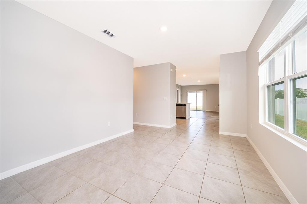 1500 Quinta Road Kissimmee, FL 34744 - Photo 7 of 34 a view of a kitchen with furniture and a window