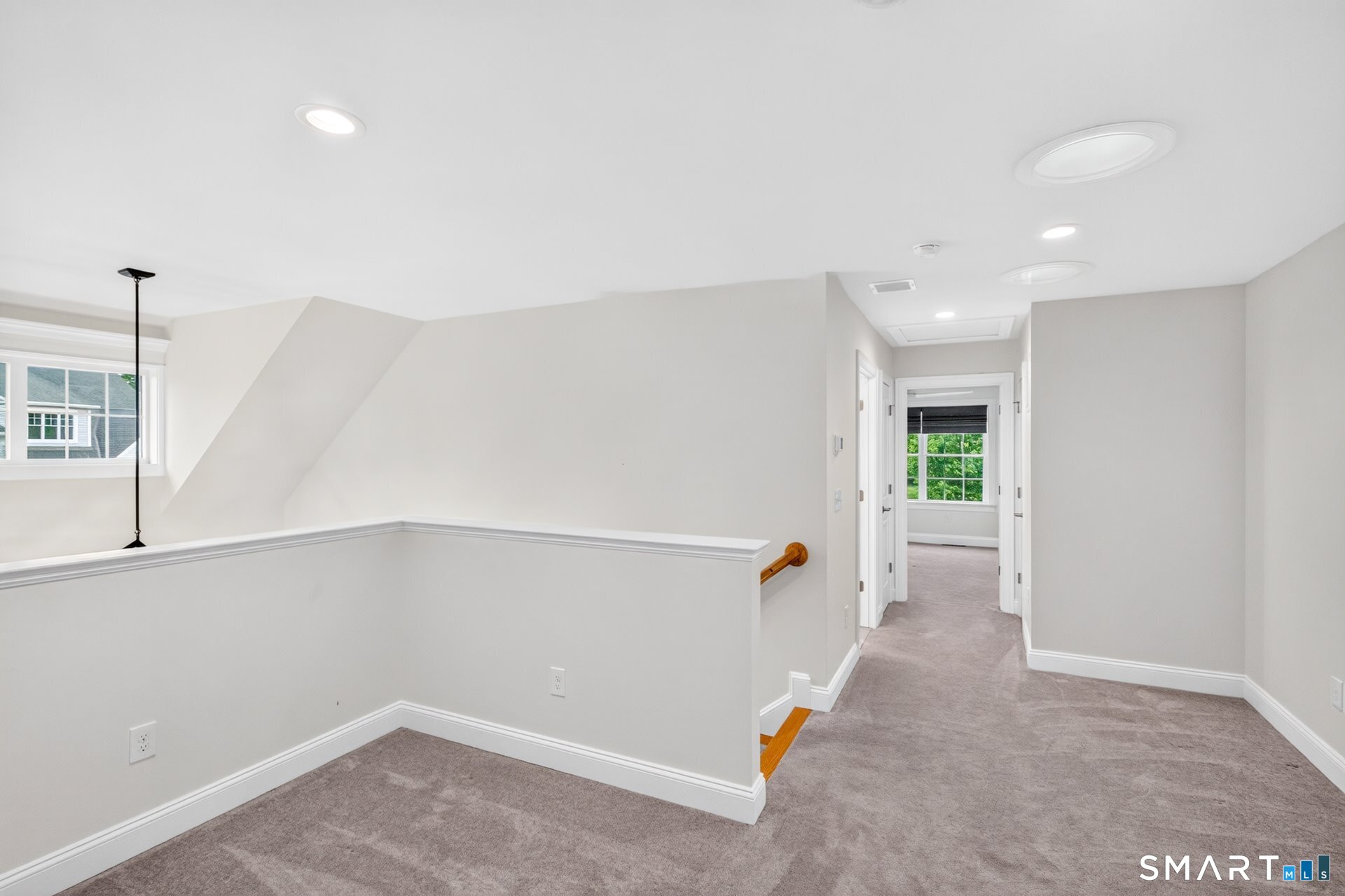6 Prospect Ridge, Unit 6 Simsbury, CT 06070 - Photo 25 of 33 The loft area divides the 2 upstairs bedroom