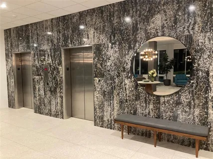 a view of a palm trees in front of a building