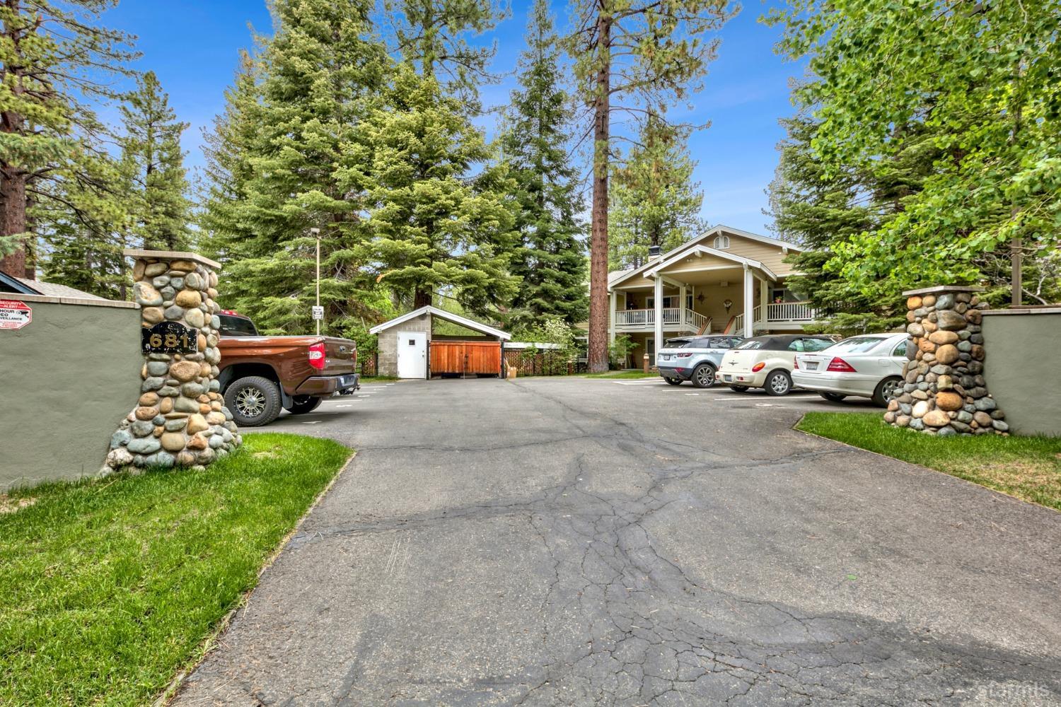 681 Eloise Avenue, Unit 3 South Lake Tahoe, CA 96150 - Photo 1 of 16 a view of street with parked cars