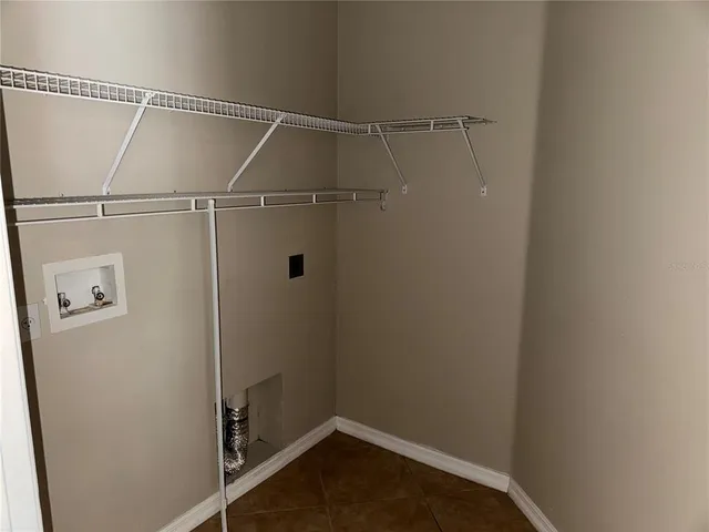 a view of a room with racks on the wall