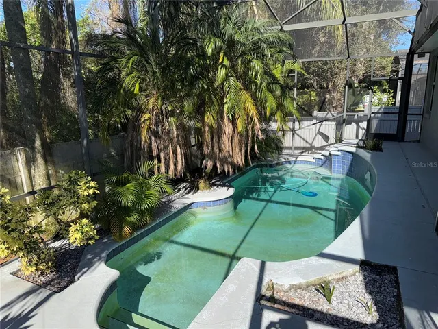 a view of yard with patio