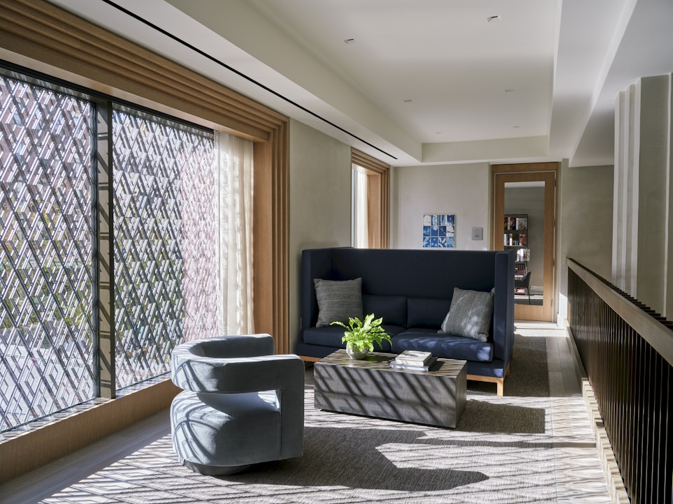 543 West 122nd Street, Unit 16A Manhattan, NY 10027 - Photo 11 of 32 a living room with furniture and a potted plant