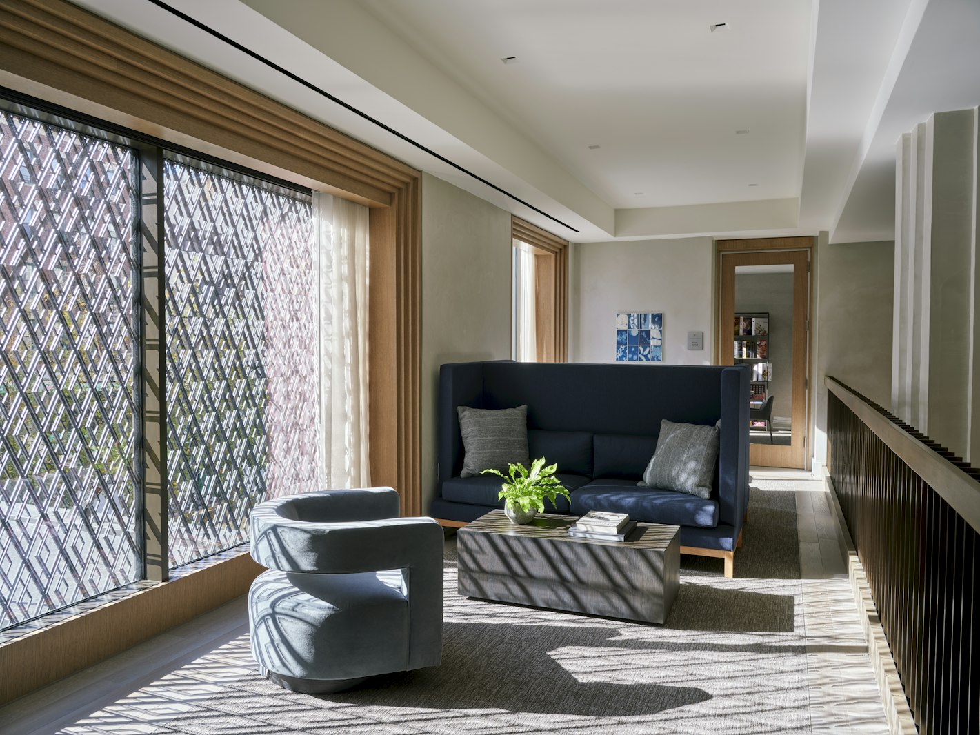 543 West 122nd Street, Unit 16A Manhattan, NY 10027 - Photo 26 of 32 a living room with furniture and a potted plant