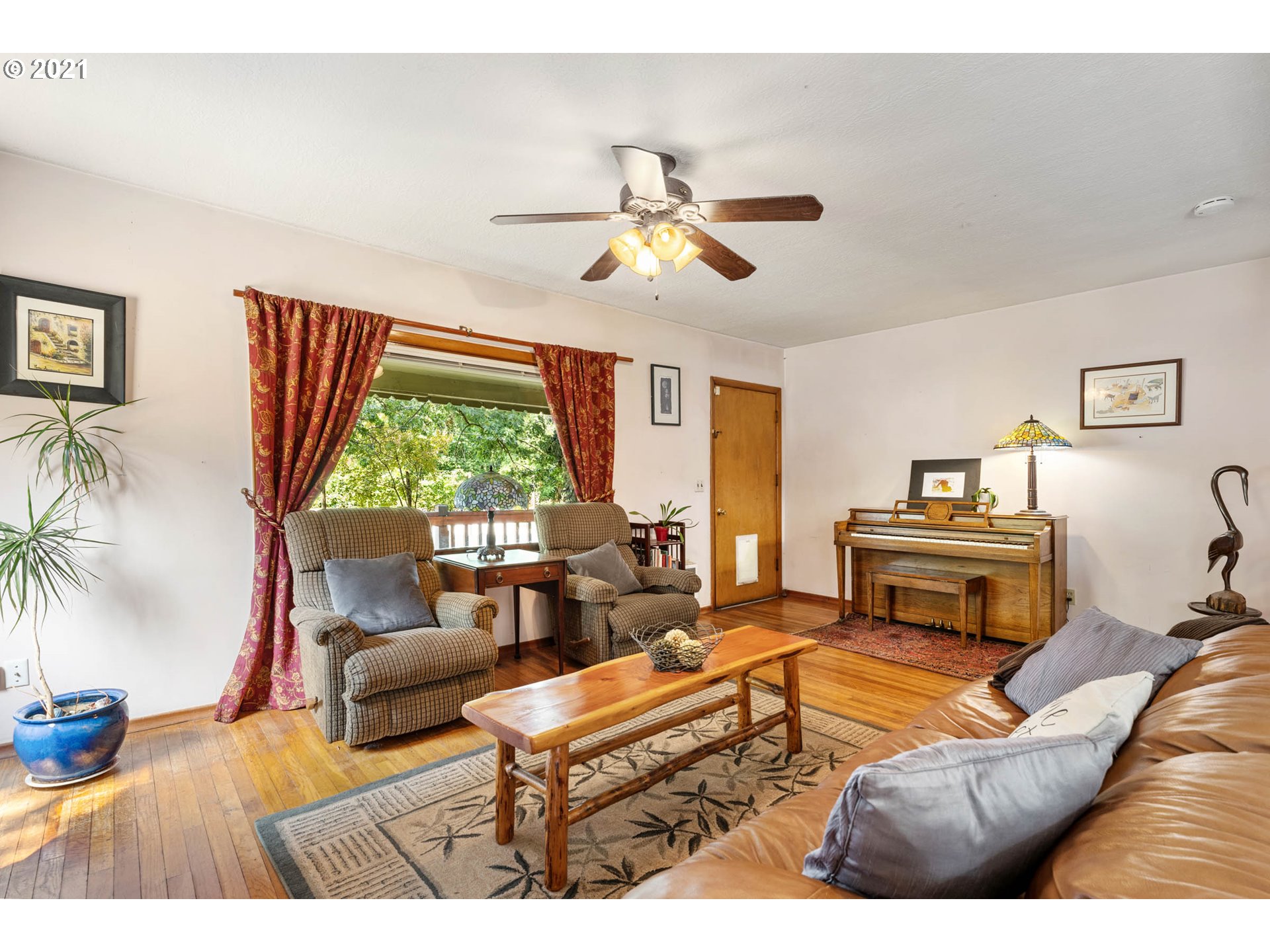 1006 Northeast 194th Street Ridgefield, WA 98642 - Photo 5 of 32 a living room with furniture and a large window